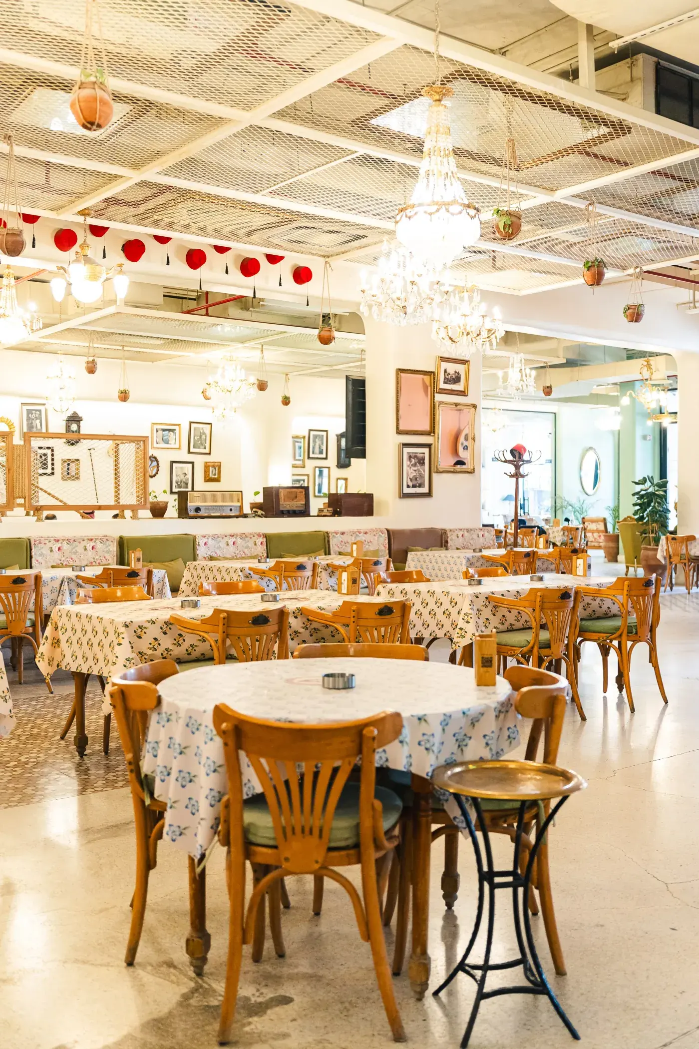 The dining room under chandeliers and lanterns, Al Falamanki Riyadh